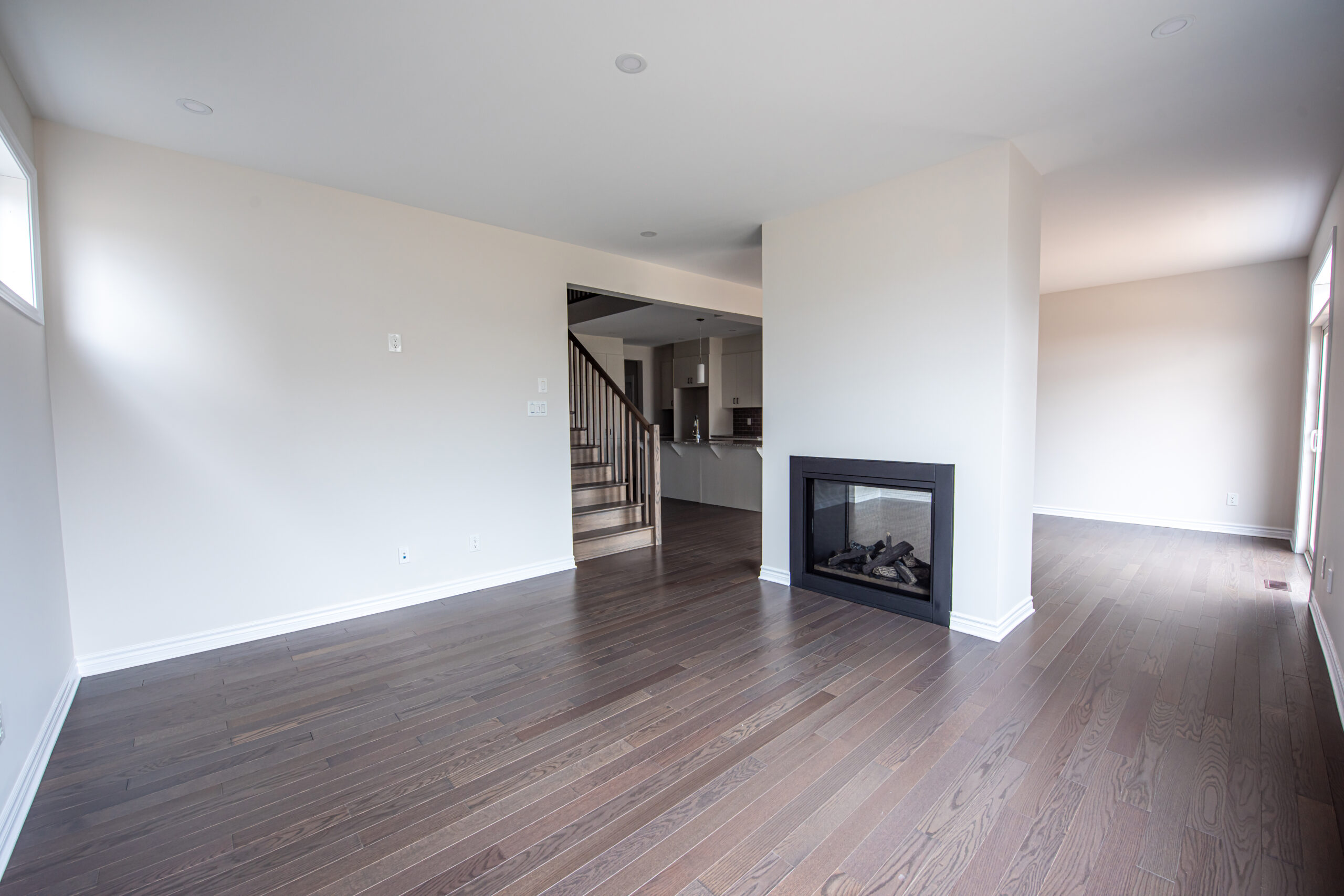 Empty living room with fire place unfurnished brand new house or apartment